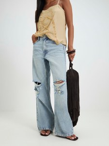 Jeans de mezclilla 100% algodón de cintura media, lavado a la piedra claro, rasgados, de pierna ancha y corte holgado, ecológicos, resistentes a la decoloración, ligeros, para primavera. - Product Image 3