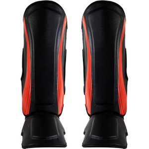 Espinilleras de fútbol para adultos, negras y naranjas, con protección para los tobillos. - Product Image 1