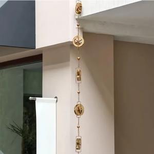 Cadenas de lluvia metálicas con forma de rueda que favorecen un sistema ecológico de flujo de agua de lluvia y crean un efecto de agua de lluvia circular. - Product Image 4