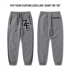 Men Windbreaker Pant Lightweight Nylon Fabric 120 GSM Grey <b>Jogger</b> with <b>Zip</b> <b>Pockets</b> Elastic Cuffs Drawcord Waist and Custom Logo - Product Image 1