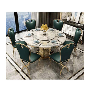 ชุดรับประทานอาหารพรีเมี่ยมมีสไตล์พร้อมโต๊ะหินอ่อนทรงกลมขาเหล็กที่ทันสมัยและเก้าอี้หนังเพิ่มความพรีเมียมให้กับทุกบ้าน - Product Image 3