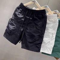 Shorts cargo d'été pour hommes en toile fine, décontractés, avec poches zippées, couleur unie, séchage rapide, taille élastique, coupe droite