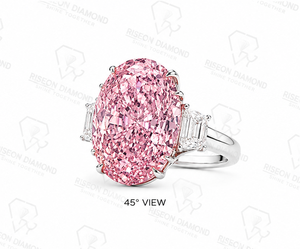 Extraordinary <b>statement</b> <b>ring</b> in platinum finish 18K white gold with fancy pink oval diamond and tapered baguette side diamonds - Product Image 6