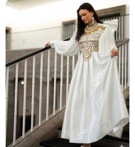 Luxurious <b>White</b> Silk Long <b>Maxi</b> Dress Featuring Intricate Gold Thread Embroidery On Bodice And High Neck With Oversized Billowing - Product Image 6