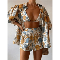 Ensemble de plage vintage en lin mélangé à fleurs pour femmes, composé d'un chemisier à manches bouffantes et à col ouvert, d'un bikini assorti et d'un short cargo