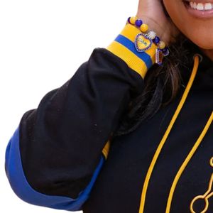 Conjunto Deportivo Retro Sigma Gamma Rho para Mujer, Negro, Azul y Dorado, Traje Deportivo de Dos Piezas, Estilo Casual y Urbano, Hermandad Griega 1922 - Product Image 6