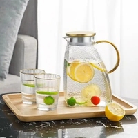 Vente en gros de carafes à eau en verre borosilicate de haute qualité personnalisées de 1500 ml et 1800 ml avec couvercle en métal pour le thé et le café