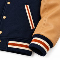 Veste universitaire pour homme en laine marine avec manches en cuir marron, logo brodé, vêtement d'automne