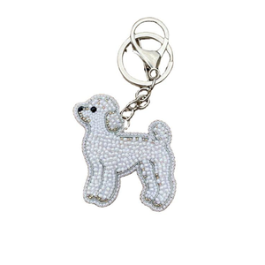 Porte-clés ethnique artisanal perlé de qualité supérieure, fait main par des artisans indiens, avec sangle en cuir durable et anneaux en peluche - Product Image 1