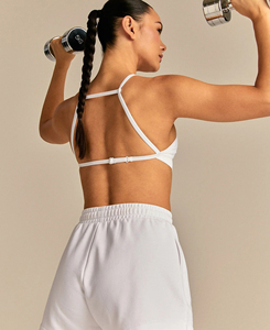เสื้อชั้นในโยคะแบบไร้ตะเข็บสำหรับผู้หญิง สีขาว ทรง Racerback รองรับปานกลาง ลายเรียบ คอวี ผลิตตามสั่ง ทำจากผ้าสแปนเด็กซ์และโพลีเอสเตอร์ เหมาะสำหรับออกกำลังกาย - Product Image 2