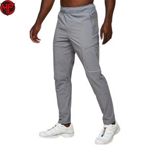 Pantalones cortavientos personalizados al por mayor para hombre, ajustados, 100% poliéster, nailon, pantalones cortavientos para hombre - Product Image 5