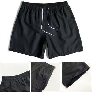 Shorts de sport décontractés pour hommes 100 % polyester, séchage rapide, taille mi-haute, avec cordon de serrage, motif uni, doublure respirante - Product Image 1