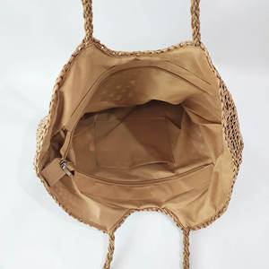 Experience effortless elegance with this stunning Natural yarn bag featuring a carved <b>top</b> line and a patterned bottom accent - Product Image 5