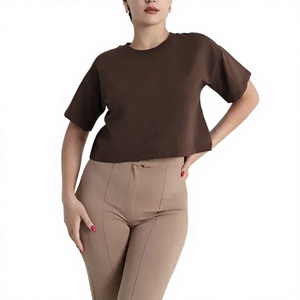เสื้อยืดคอกลมสีพื้นเรียบง่าย ระบายอากาศได้ดี เป็นมิตรกับสิ่งแวดล้อม ไซส์ใหญ่ สำหรับผู้หญิง สวมใส่สบายๆ ในฤดูใบไม้ร่วง พร้อมกางเกงขายาวสีขาว - Product Image 1