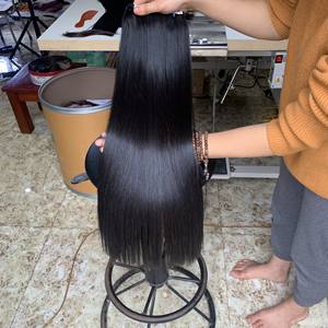 ผมต่อแบบขายส่ง ผมเวียดนามแท้แบบเป็นมัด เย็บด้วยเครื่องจักรสองชั้น น้ำหนัก 100 กรัม ผมตรงแบบธรรมชาติ ผมหยักศก ผมลอน ผมสีธรรมชาติ - Product Image 1