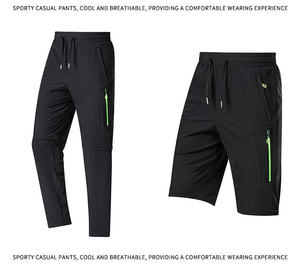 Pantalones de Senderismo Negros Convertibles con Bolsillos con Cremallera y Detalles Verdes para Actividades al Aire Libre - Product Image 2