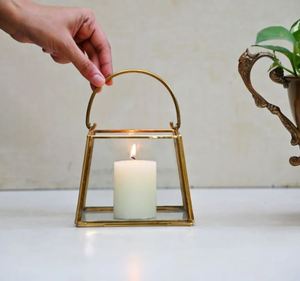 The <b>lantern</b> comes with a sturdy metal handle on top that not only allows you to carry it around easily but also - Product Image 3