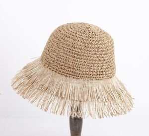 Sombrero de Paja para Mujer, Estilo Nuevo, Color Beige, para Verano, Vacaciones, con Borlas y Ala Ancha, para la Playa - Product Image 1