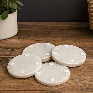 ชุดจานรองแก้วหินอ่อนสีขาวบริสุทธิ์สุดหรู จำนวนสี่ชิ้น รูปทรงกลมขัดเงา ตกแต่งด้วยหินธรรมชาติ - Product Image 2