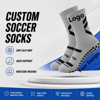 Chaussettes de football personnalisées à forte valeur ajoutée Chaussettes à prise en main d'usine Chaussettes antidérapantes