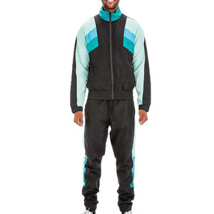 Ensemble de survêtement coupe-vent pour homme, coupe ample, en nylon et polyester, vêtements de sport, veste et pantalon respirants et coupe-vent - Product Image 1