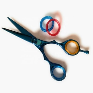 Ciseaux de salon en acier inoxydable bleu premium avec lames affûtées, vis réglable et repose-doigts pour la coupe et le coiffage des cheveux - Product Image 1