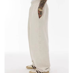 Pantalon de survêtement en coton pour homme, style streetwear, coupe évasée, jambe droite ample et cordon de serrage, design décontracté à jambe large. - Product Image 2