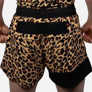 กางเกงชกมวย MMA ลายเสือดาวพิมพ์ลายแบบ Sublimation สำหรับผู้ชาย เอวยางยืด ลายเรียบ ระบายอากาศได้ดี สวมใส่สบาย เหมาะสำหรับการฝึกซ้อม MMA และ Grappling - Product Image 3