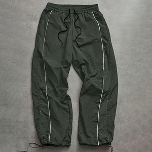 Pantalon décontracté droit imperméable pour homme en polyester/nylon noir, fermeture à cordon, tissé mi-lourd, service OEM pour l'hiver - Product Image 1