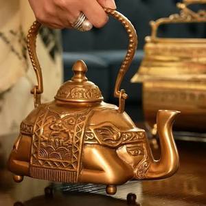 Théière en métal en forme d'éléphant oriental avec couvercle et poignée, bouilloire décorative - Product Image 1