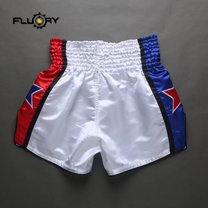 Pantalones cortos de muay thai Fluory Boxing, azules y rojos con estrellas, personalizados. - Product Image 1