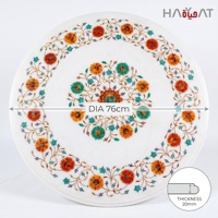 Table basse ronde moderne en marbre blanc avec incrustations florales, pièce maîtresse pour le salon