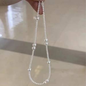 Collier en perles naturelles fantaisie de grand diamètre 7-12 mm plaqué or 18 carats avec un design tissé de perles laser - Product Image 1