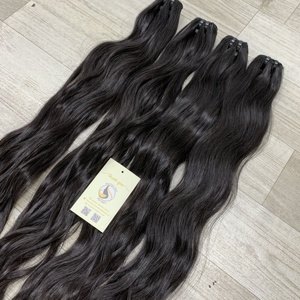 Vente en gros de haute qualité doux vietnamien naturel noir brut vierge corps ondulé Curl pour Genius trame Extensions de cheveux haute cheveux humains - Product Image 4