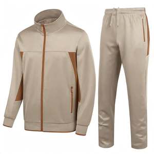 Ensemble de survêtement pour homme, veste zippée à blocs de couleur et col montant, pantalon à taille élastique, fabricant personnalisé éco-responsable - Product Image 1
