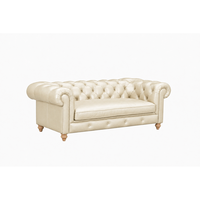 Canapé Chesterfield en cuir véritable ivoire avec dossier capitonné et accoudoirs roulés, trois places, pour salon