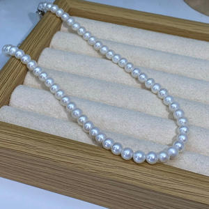 Collier de perles d'eau douce naturelles de haute qualité 6-7 mm Blanc froid Lumière Presque parfaitement circulaire avec de légères imperfections Sans noyau - Product Image 4