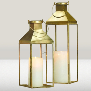 Moderna Linterna Decorativa Portátil Ecológica de Metal y Vidrio con Acabado Dorado, Linterna para Velas para Bodas y Exteriores - Product Image 1