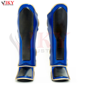Protections de tibia personnalisées bicolores bleu et noir avec bordure dorée métallique, équipement d'arts martiaux haute performance, fabricant - Product Image 2
