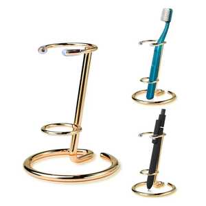 Soporte de pared para cepillos de dientes de metal dorado con montaje circular, organizador moderno para baño, para pasta de dientes y artículos esenciales para el cuidado bucal - Product Image 1