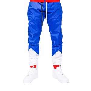 Pantalon coupe-vent imperméable de haute qualité, léger, streetwear, décontracté, jogging, entraînement, vêtements de sport, OEM ODM - Product Image 1