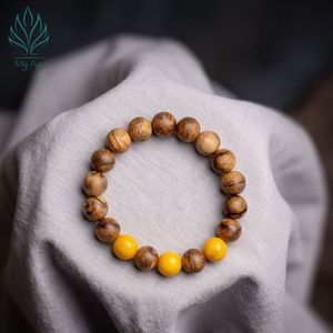 กำไลข้อมือลูกปัดแบบยูนิเซ็กซ์ขายดี กำไลไม้กฤษณาเวียดนามธรรมชาติคลาสสิก ประดับด้วยปะการังสีเหลือง AL-SV-0032-10 ทำด้วยมือ - Product Image 4