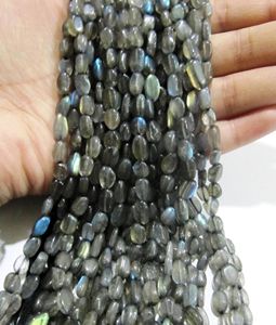 Cuentas de labradorita natural ovaladas lisas de 6 a 10 mm, hebras azules brillantes de 13 pulgadas de largo - Product Image 3