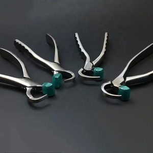 Kit de 4 pinces universelles mini-invasives pour l'extraction dentaire Instrument dentaire avec cassette en acier inoxydable - Product Image 5