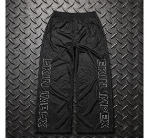 Pantalon de survêtement ample et respirant en nylon pour homme, style streetwear, avec broderie personnalisée, imperméable et coupe oversize - Product Image 1