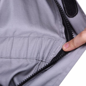 ชุดยูนิฟอร์มช่างแบบชิ้นเดียวสีตัดกันสำหรับงานอุตสาหกรรม ชุดคลุมทำงาน ชุดบอดี้สูทสีแดงเทา พร้อมเสื้อแจ็คเก็ตสำหรับทำงาน ขายส่งจากผู้ผลิต - Product Image 3