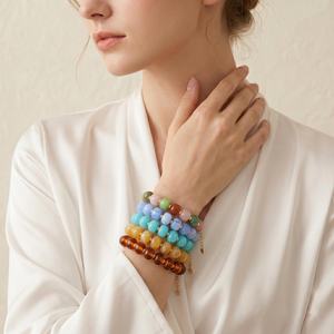 กำไลข้อมือเรซิ่นประดับลูกปัดทำมือ สีสันสดใส รูปทรงลูกคิด สามารถซ้อนกันได้ ปรับขนาดได้ เหมาะสำหรับผู้หญิง ขายส่ง - Product Image 1