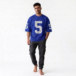 เสื้อเจอร์ซีย์คอกลมแฟนคลับ ราคาถูก คุณภาพสูง ดีไซน์ตาข่าย แบบยูนิเซ็กซ์ สำหรับอเมริกันฟุตบอล ระบายอากาศได้ดี ไซส์ใหญ่ ป้องกันรังสียูวี แห้งเร็ว - Product Image 1