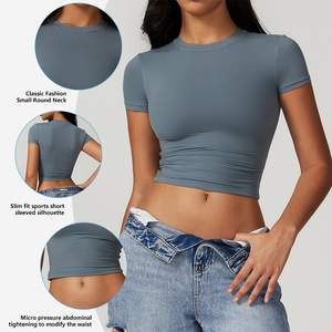 Camiseta corta ajustada para mujer, manga corta, cuello redondo, tela transpirable de secado rápido, moderna, informal y a la moda. - Product Image 1