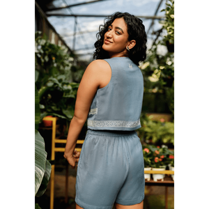 Conjunto Coordinado Bordado Aura Azure: Top Corto con Lazos Delanteros y Shorts Festoneados en Tono Azul Pizarra, y Duo Artesanal de Chaleco y Short en Mezcla de Lino Azul - Product Image 1